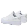 A pair of white Nike Court Legacy Lift sneakers shown from a side-rear angle against a white background. Podgląd zdjęcia produktu