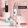 Four mini power banks in different colors are displayed on pink pedestals against a light pink and white background. Produktbild-Vorschau