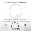 A white smoke detector with text and icons indicating activation and battery life. Produktbild-Vorschau