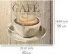 A close-up of a coffee cup with frothy milk on a wooden background, with dimensions indicated. Produktbild-Vorschau