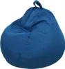 A blue beanbag chair is shown against a white background. Voir les images du produit