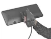 A hand holding the back of a dark gray patio heater. Produktbild-Vorschau