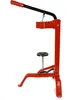 A red and black manual bottle capper is shown against a white background. Anteprima dell’immagine prodotto