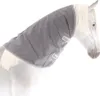 A gray horse neck cover is shown on a white horse. Voir les images du produit