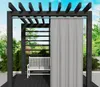 An outdoor pergola with a bench and a curtain, set in a garden environment. Podgląd zdjęcia produktu