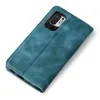 A teal flip cover case for a smartphone is shown on a white background. Produktbild-Vorschau