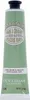 A product shot of a L'Occitane hand cream tube. Náhled obrázku produktu