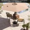 An outdoor patio scene with a large umbrella, two chairs, and a small wooden table next to a pool. Podgląd zdjęcia produktu