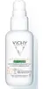 A white bottle of Vichy Capital Soleil UV Clear sunscreen with a pump dispenser. Anteprima dell’immagine prodotto