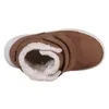 A top-down view of a brown winter boot with white fur lining. Podgląd zdjęcia produktu