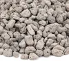 A pile of small, light-colored stones. Produktbild-Vorschau