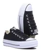 A pair of black Converse platform sneakers on a white background. Voir les images du produit