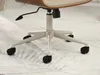 Close-up of the base of an office chair with five wheels. Anteprima dell’immagine prodotto