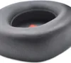 A close-up view of a black ear cushion for headphones. Produktbild-Vorschau