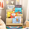 Vorderansicht des SoBuy Kinderregals KMB106-HG mit drei Ebenen, dekoriert mit bunten Buchcovern vor einem Hintergrund mi Náhľad obrázku produktu