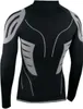 The back of a black long-sleeved thermal shirt with gray accents. Produktbild-Vorschau