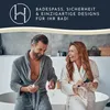 A couple in bathrobes laughing in a bathroom. Produktbild-Vorschau