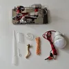 A collection of parts for a Stirling engine model and a small LED light bulb are laid out on a white surface. Náhľad obrázku produktu