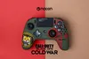 A Call of Duty Black Ops Cold War themed Nacon Revolution Unlimited Pro Controller is displayed on a split red and brown background. Produktbild-Vorschau