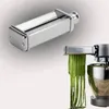 A Kenwood pasta attachment is shown making fettuccine pasta, with a separate image of the attachment itself. Produktbild-Vorschau