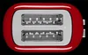 Top-down view of a red toaster with the slots visible. Anteprima dell’immagine prodotto