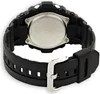 The back of a black digital watch with a silver metal case and a black rubber strap. Produktbild-Vorschau