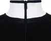 A close-up view of the collar and zipper of a black jacket with white and navy trim. Produktbild-Vorschau