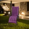 A purple chair cushion on a recliner chair placed on a grassy lawn at night, with outdoor lighting. Náhled obrázku produktu