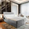 A luxurious bedroom with a bed, chairs, and decorative wall. Produktbild-Vorschau