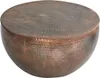A round, hammered metal coffee table with a copper finish. Produktbild-Vorschau