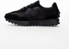 A black New Balance sneaker is shown from the side against a white background. Anteprima dell’immagine prodotto