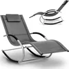 A modern rocking lounge chair with a headrest, shown from a diagonal angle. Podgląd zdjęcia produktu