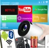 A collage of a projector, its accessories, and a smartphone displaying various app icons and connectivity symbols. Náhled obrázku produktu