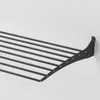 A black metal wall-mounted drying rack is shown against a white background. Produktbild-Vorschau