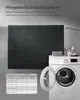 A dark gray rug is displayed hanging on a wall, with a washing machine and laundry products in the foreground. A table with rug sizes and washing machine capacity is also visible. Produktbild-Vorschau