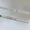 Two metal drawer slides are shown against a light gray background, one above the other. The top slide is fully extended, while the bottom slide appears to be partially extended and shows ball bearings. Anteprima dell’immagine prodotto