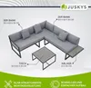 A diagram of a sectional outdoor sofa set with a coffee table and side table, showing dimensions and labels. Produktbild-Vorschau