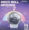 The image shows the packaging for a disco ball diffuser with a psychedelic background. Produktbild-Vorschau