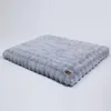 A gray orthopedic dog bed is shown from a side angle on a white background. Anteprima dell’immagine prodotto