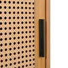 A close-up view of a wooden cabinet with a rattan weave door and a black handle. Produktbild-Vorschau