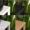 A collage of four close-up shots of plant stands in different colors, with green foliage in the background. Anteprima dell’immagine prodotto
