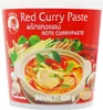 A product shot of a red tub of curry paste with ingredients and a bowl of curry depicted on the packaging. Voir les images du produit