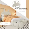 A bedroom scene featuring a bed with a bunny-shaped headboard and decorative pillows. Náhled obrázku produktu