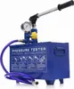 A blue pressure testing pump with a silver handle and a pressure gauge. Anteprima dell’immagine prodotto