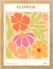 A framed art print featuring a colorful, abstract floral design. Anteprima dell’immagine prodotto
