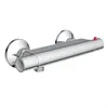 A chrome shower faucet with a thermostat and a red temperature adjustment button. Produktbild-Vorschau