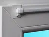 Close-up of a window curtain rod mounting bracket and part of the rod. Produktbild-Vorschau