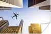 MuchoWow® Poster Flugzeuge zwischen den Wolkenkratzern Produktbild-Vorschau 1
