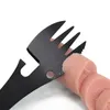 A close-up shot of a black multi-tool fork piercing a sliced sausage. Produktbild-Vorschau