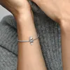 A close-up shot of a person's arm wearing a silver Pandora bracelet with a cat charm. Náhľad obrázku produktu